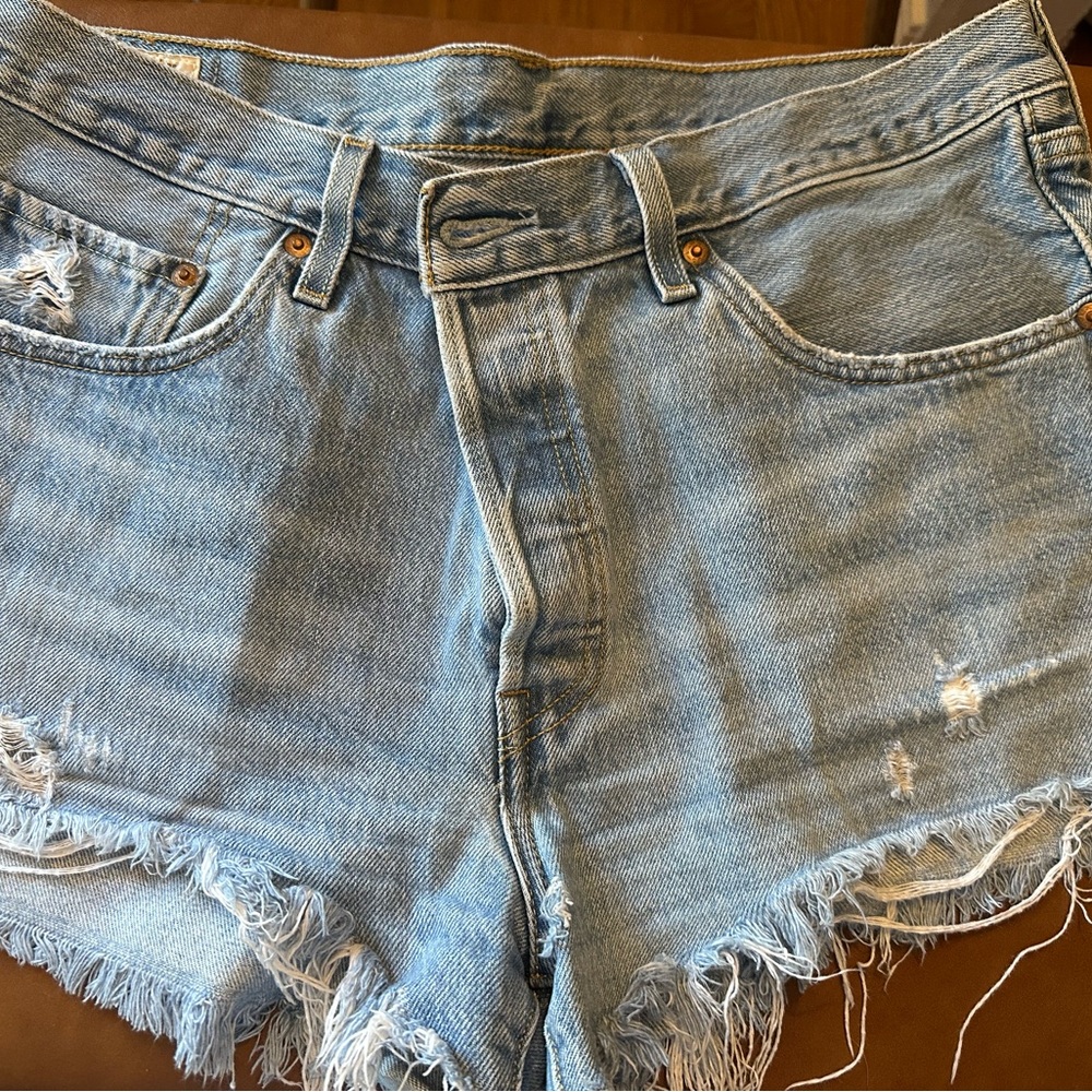 Levi’s 501 cutoff button fly shorts light wash